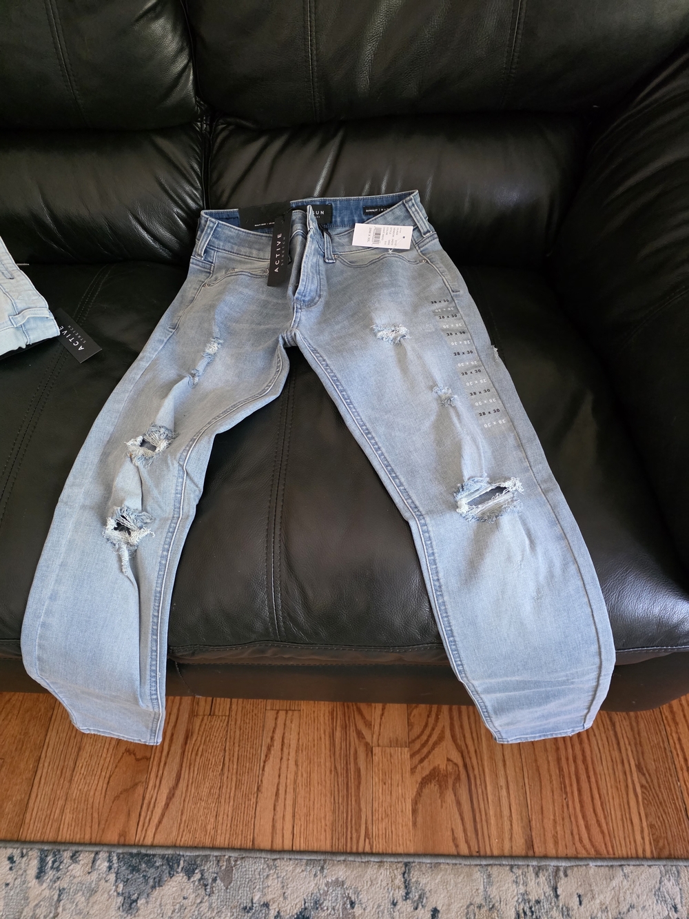 Men's Skinny Ripped Light Blue Jeans with Stud Detail